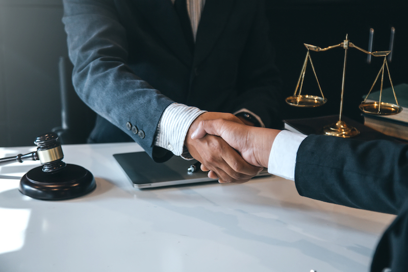 Businessman,Shaking,Hands,To,Seal,A,Deal,With,His,Partner